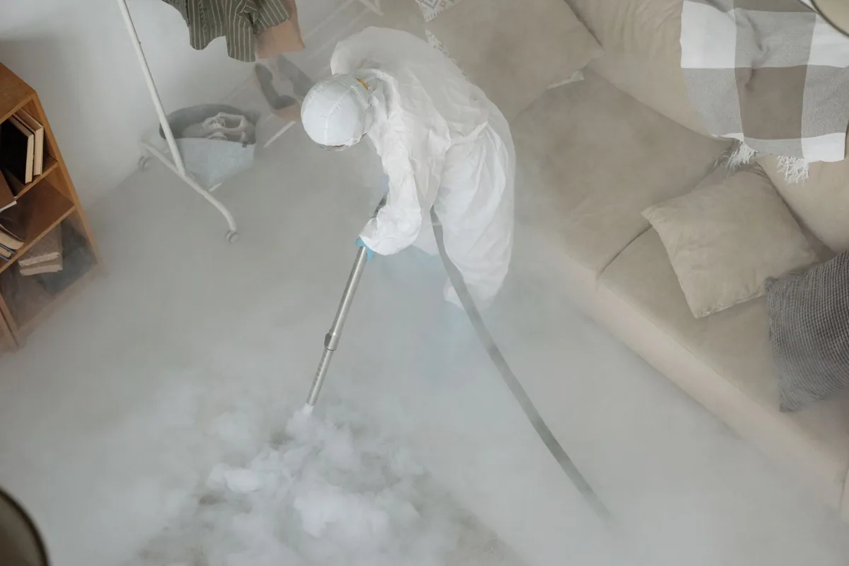 Biohazard cleanup technician in protective equipment, Baxley, GA